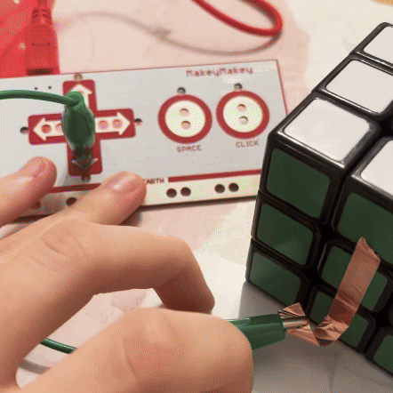 When one side of the Rubik's Cube is touched, it moves the P5 cube.