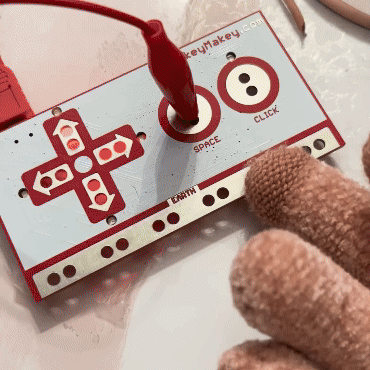 I explored using a glove that has conductive fingertips and I connected it to the MakeyMakey so when it is clicked it changes the P5.
